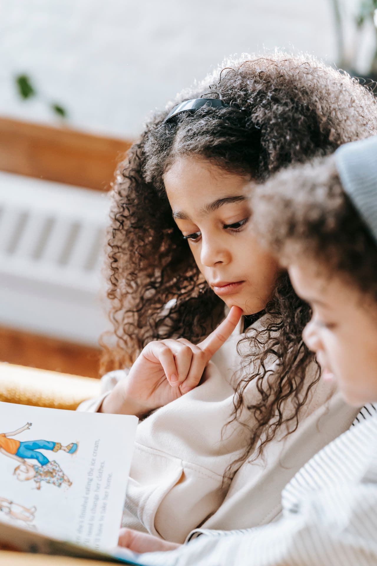 A young student focused on her reading